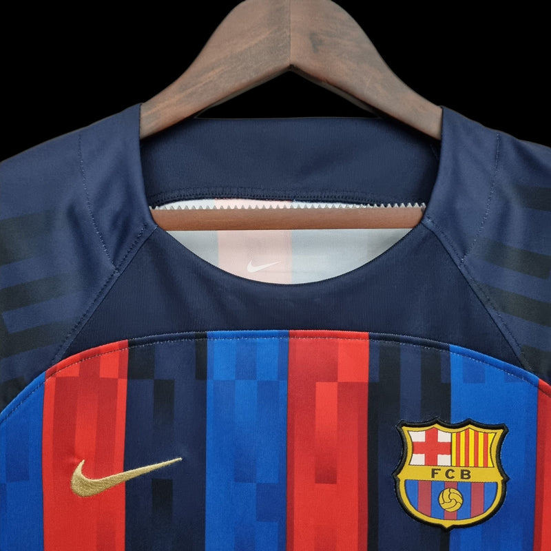 Barcelona 22/23 Camisa 1 / Torcedor Feminina
