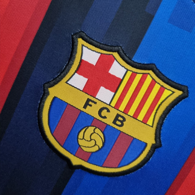 Barcelona 22/23 Camisa 1 / Torcedor Feminina